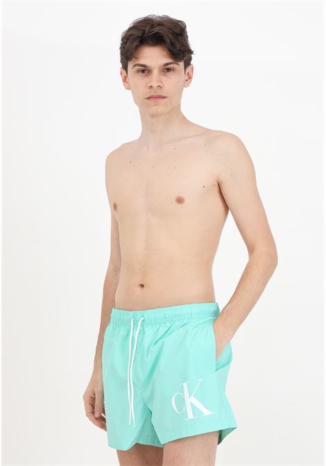 Aquamarine men's swim shorts with maxi CK monogram logo print CALVIN KLEIN | KM0KM00967LB9